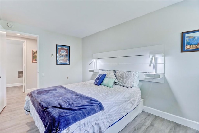 bedroom featuring light hardwood / wood-style floors