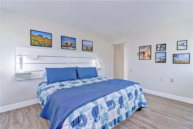 bedroom with light wood-type flooring