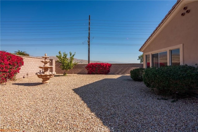 view of yard featuring a fenced backyard