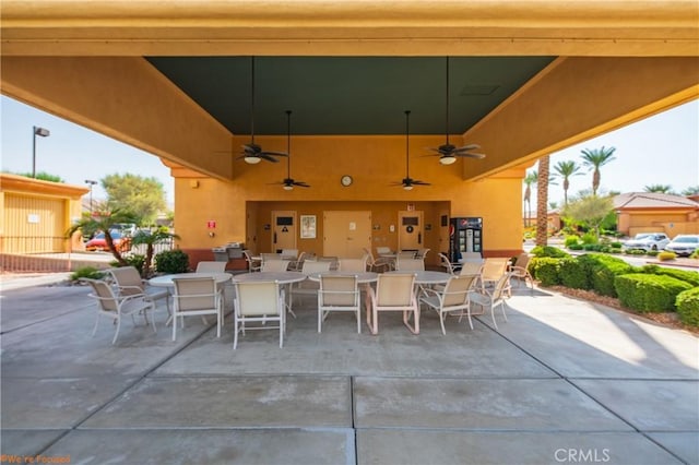 view of patio / terrace featuring a ceiling fan and outdoor dining space