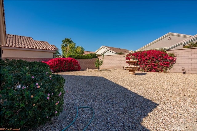 view of yard featuring a fenced backyard