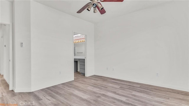 unfurnished living room with ceiling fan and light wood finished floors