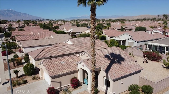 birds eye view of property featuring a residential view and a mountain view