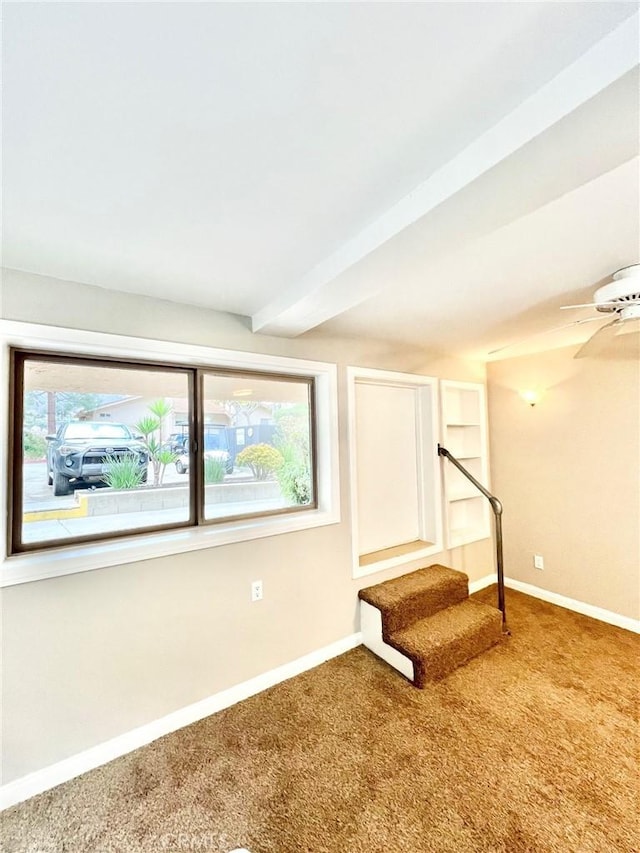 64 Avalon Terrace Rd, Avalon, CA 90704 - below grade area featuring carpet flooring, stairway, a ceiling fan, and baseboards