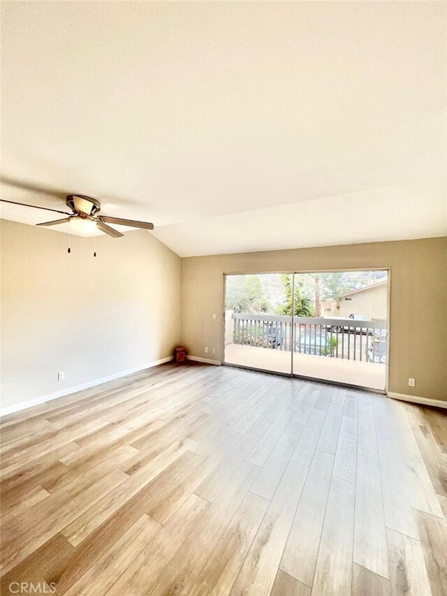 empty room featuring light hardwood / wood-style flooring and ceiling fan