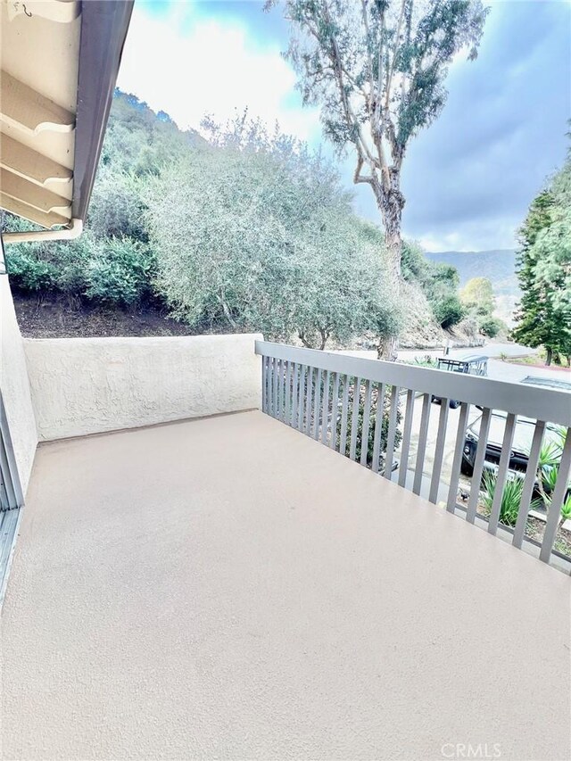 view of patio / terrace with a balcony