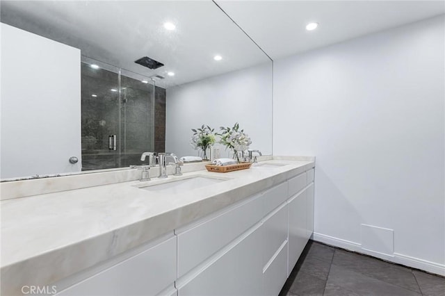 bathroom with vanity and an enclosed shower