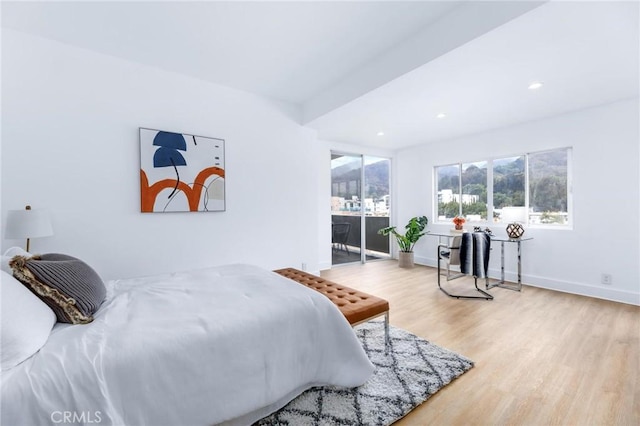 bedroom with light hardwood / wood-style floors