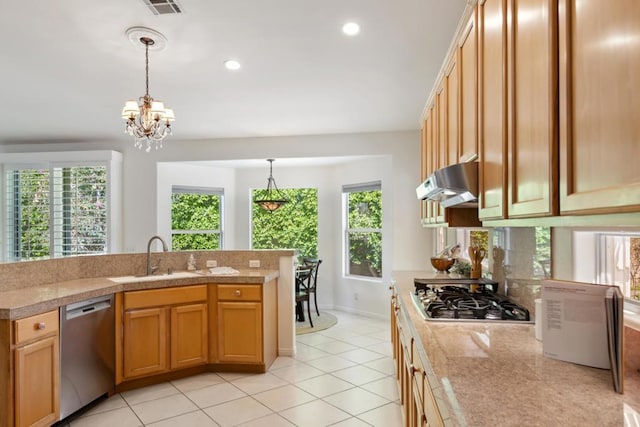 kitchen with sink, an inviting chandelier, decorative light fixtures, light tile patterned floors, and appliances with stainless steel finishes