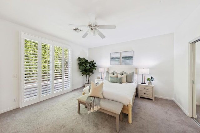 carpeted bedroom with ceiling fan and access to exterior