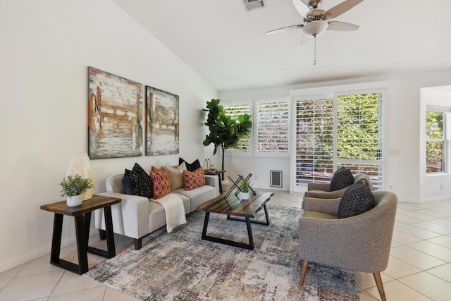 living room with lofted ceiling, light tile patterned floors, and ceiling fan