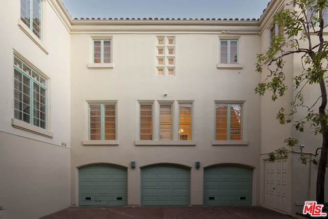 exterior space with a garage