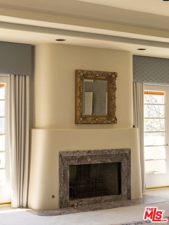 interior details featuring a high end fireplace