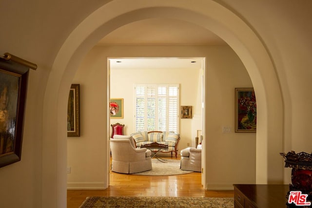 hallway with light wood-type flooring