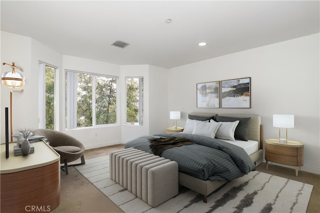 bedroom with light colored carpet