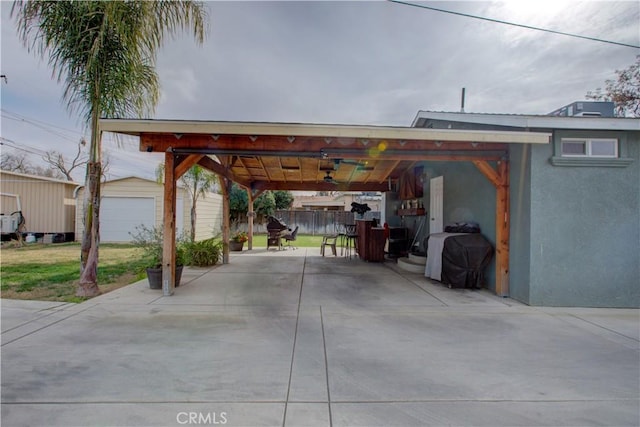 view of parking / parking lot with a garage