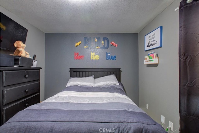 bedroom with a textured ceiling