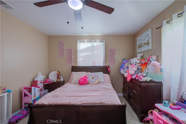 bedroom featuring ceiling fan