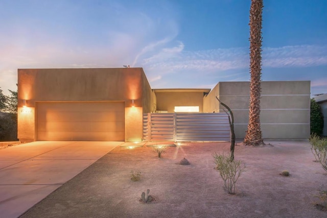 view of front of home with a garage