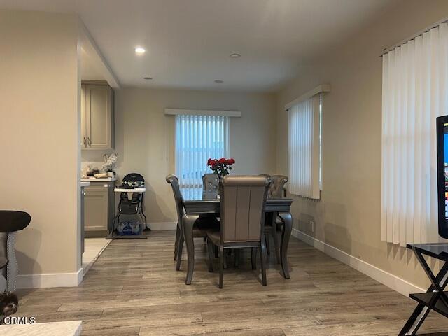 dining space featuring light hardwood / wood-style flooring