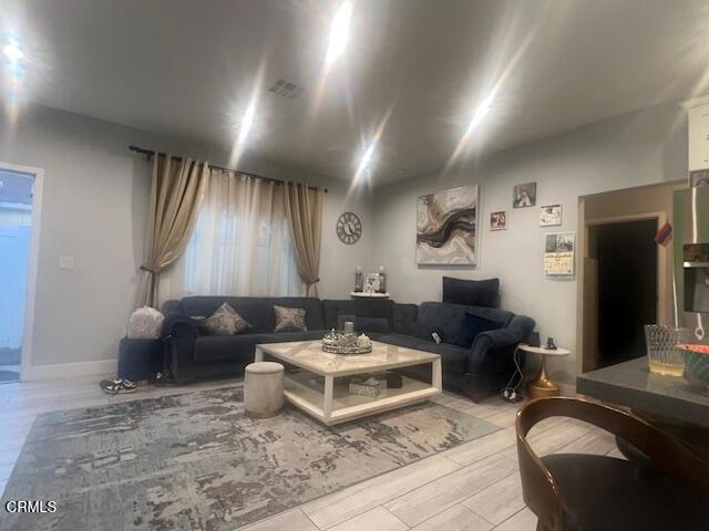 living room with light wood-type flooring