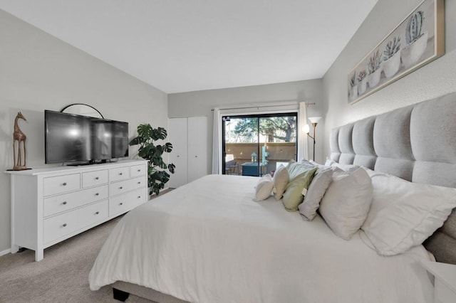 bedroom featuring light carpet