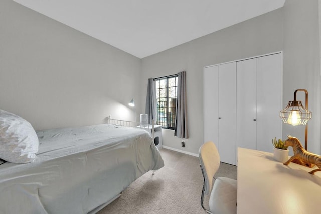 bedroom with carpet floors and a closet