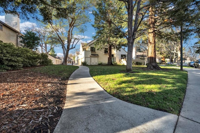 exterior space featuring a front lawn