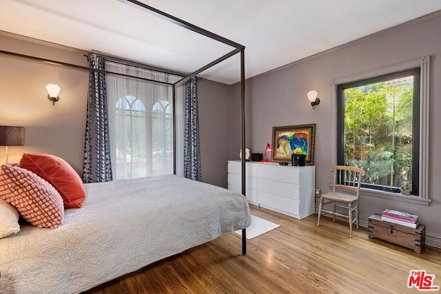 bedroom featuring hardwood / wood-style floors