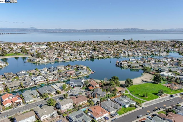 bird's eye view featuring a water and mountain view