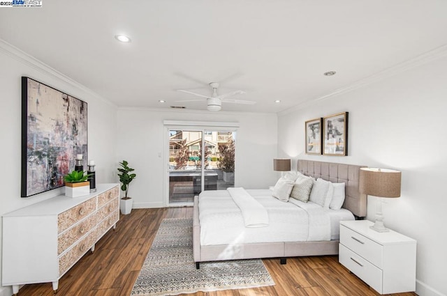 bedroom featuring hardwood / wood-style flooring, ornamental molding, and access to outside