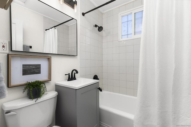 full bathroom with shower / bath combination with curtain, vanity, and toilet