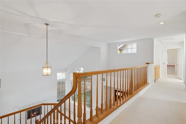 corridor with vaulted ceiling