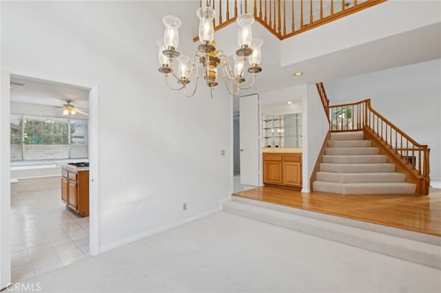 interior space featuring a notable chandelier and light tile patterned flooring