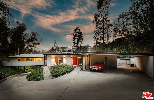 view of front of house featuring a carport