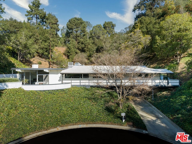 rear view of house with a sunroom