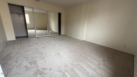 unfurnished bedroom with carpet flooring