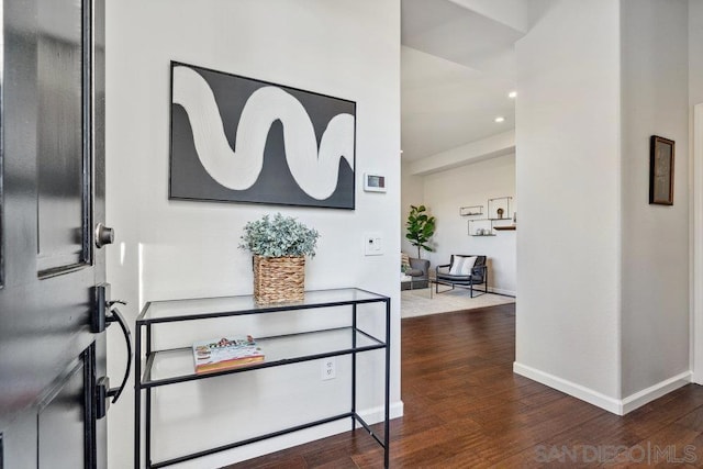 entryway with hardwood / wood-style floors