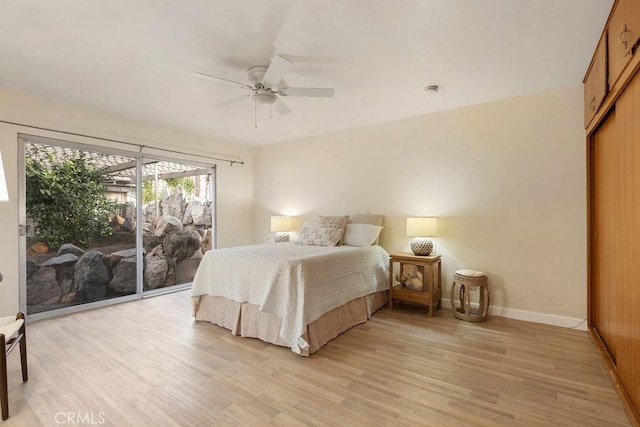 bedroom featuring ceiling fan, access to exterior, and light wood-type flooring