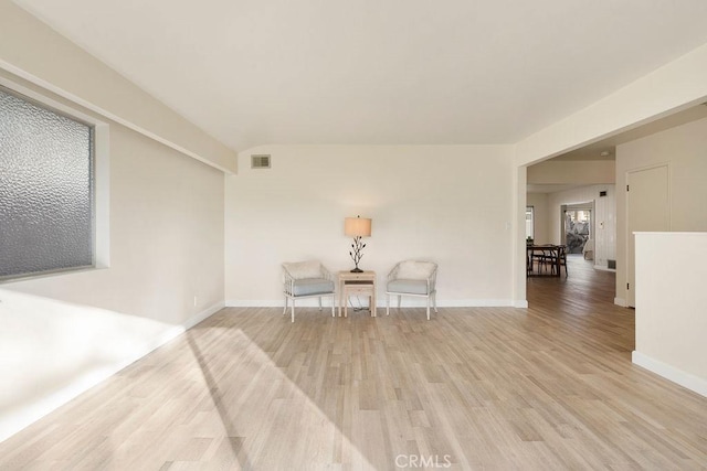 unfurnished room featuring light wood-type flooring