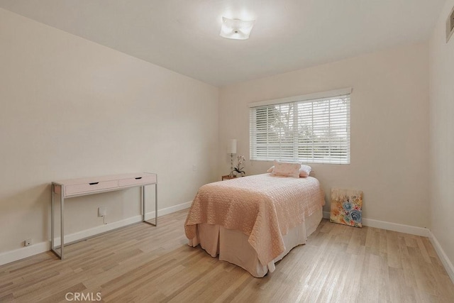 bedroom featuring light hardwood / wood-style flooring