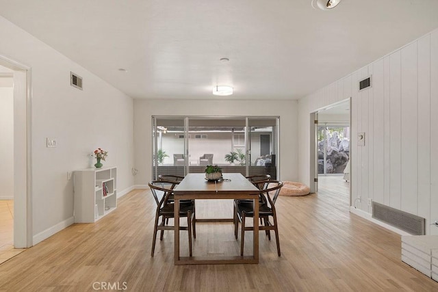 dining room featuring light hardwood / wood-style flooring