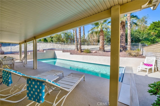 view of pool featuring a patio area