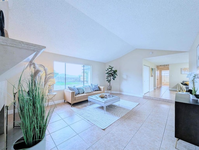 tiled living room with lofted ceiling and a textured ceiling