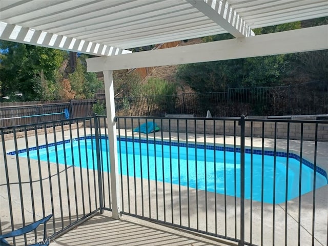 view of pool featuring a pergola