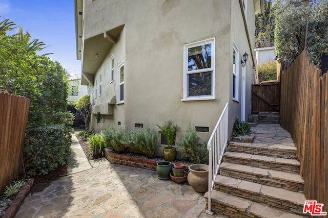 view of home's exterior featuring a patio area