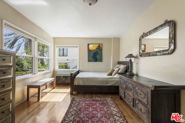 bedroom with light wood-type flooring