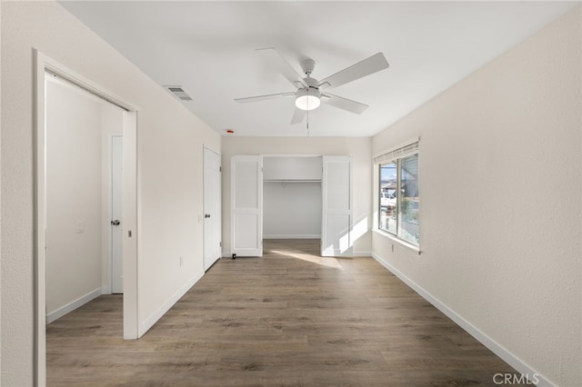 hall featuring dark wood-type flooring