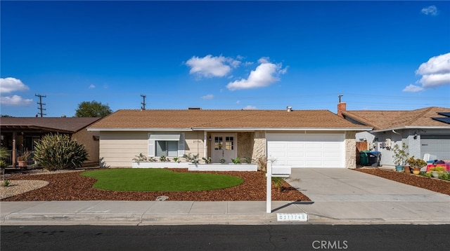 ranch-style home with a garage