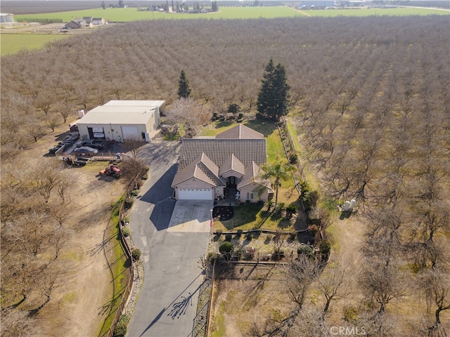 birds eye view of property featuring a rural view